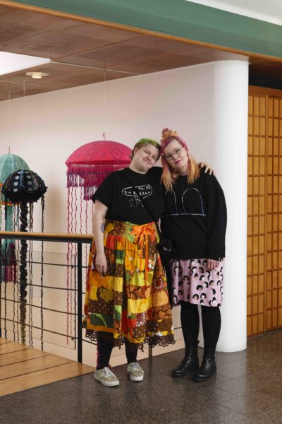 Artists Satu Tani and Maria Tani in front of their crochet artworks